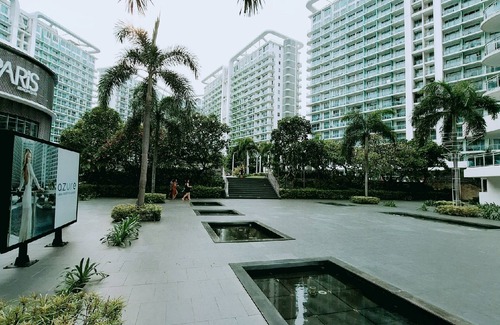 Taguig Condominio | Chic 2-bedroom condo with AC, WiFi in enchanting Parañaque
