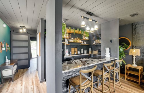 Holiday Beach Condominio | Chic & Elevated Decor: Beachfront PCB Gem w/ Patio
