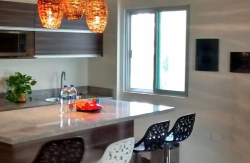 La Veleta Condominio | Elegante ático, terraza en la azotea con vistas, jardín y piscina, estacionamiento