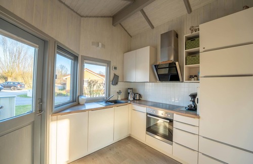 Norderteil Casa | Child-friendly 5-person wellness holiday home Treibholz with two showers and toilets, sauna, whirlpool, wood-burning stove, conservatory and canoe in Otterndorf