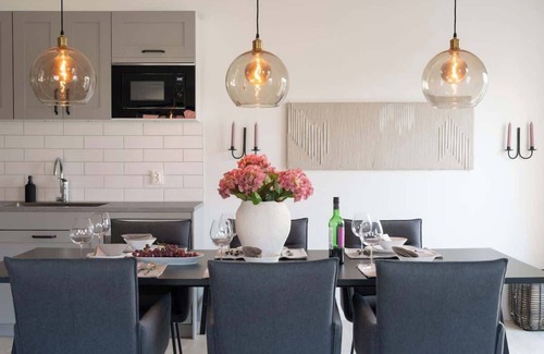 Bastad Condominio | Chocolaty Warmth Home 3BR Flat with Cozy Balcony