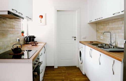 Gjirokaster Casa | City Grove: Blooms and Beds