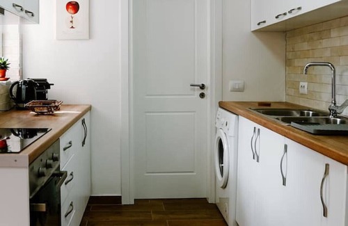 Gjirokaster Casa | City Grove: Blooms and Beds