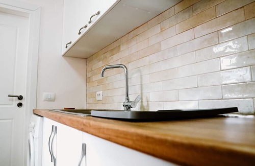 Gjirokaster Casa | City Grove: Blooms and Beds