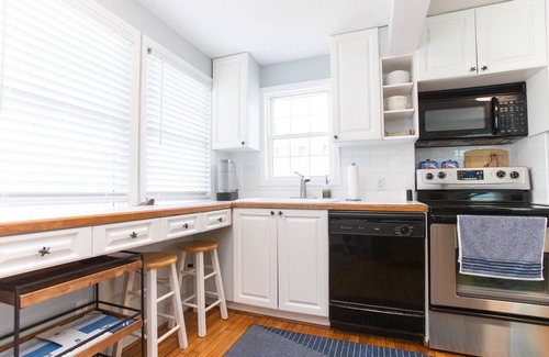 North Carolina Coast Cabaña | Classic Beach Cottage with front porch view of water