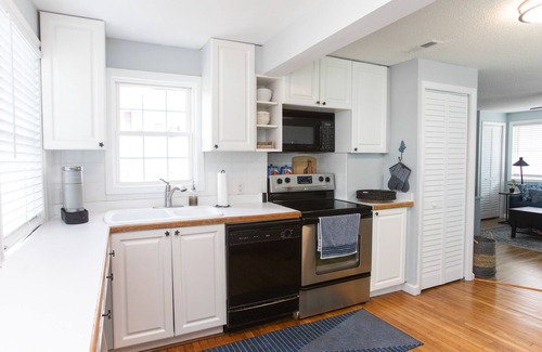 North Carolina Coast Cabaña | Classic Beach Cottage with front porch view of water