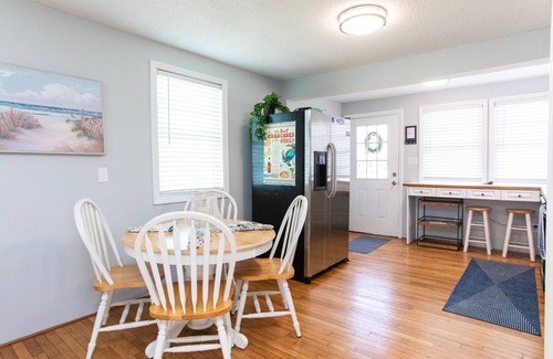 North Carolina Coast Cabaña | Classic Beach Cottage with front porch view of water