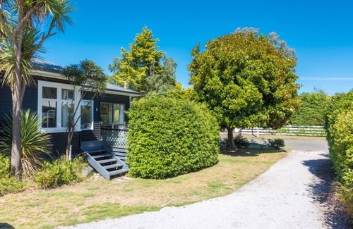 Waitahanui Casa | Experiencia de kiwi clásico en Five Mile Bay. Wi-Fi gratis.