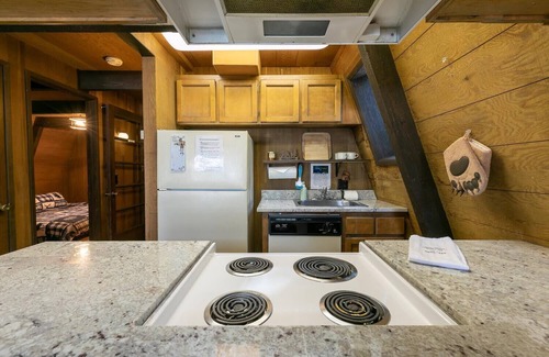 Truckee Cabina | Classic Tahoe a-frame cabin forest view floor2ceiling window. Near Northstar