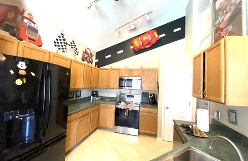 West Kissimmee Casa | CERCA DE Disney * ENORME piscina / spa * GameRm * WiFi gratis * Patio privado, habitaciones temáticas
