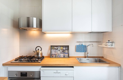 Porto San Paolo Apartamento | Cerca de la playa, apartamento para 7 personas con vista a la bahía de la isla de Tavolara, WiFi rápido.