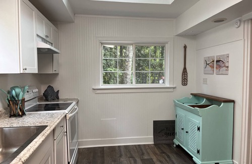 Myrtle Grove Cabaña | Close to the beach cottage within 1 mile of Carolina Beach Bridge