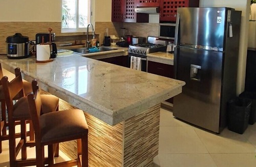 Cozumel Condominio | ¡Más cerca de la playa de arena! Vistas increíbles.