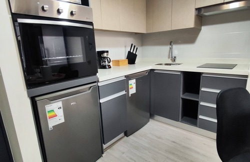 Downtown Santiago Condominio | Co-work, Gym, 24-hour Security, and water vending machine