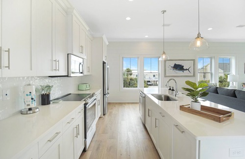 Gulf Shores Cabaña | Coastal beach cottage steps away from the white sand beaches!
