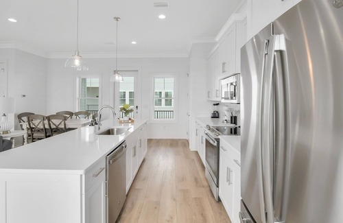 Gulf Shores Cabaña | Coastal beach cottage steps away from the white sand beaches!