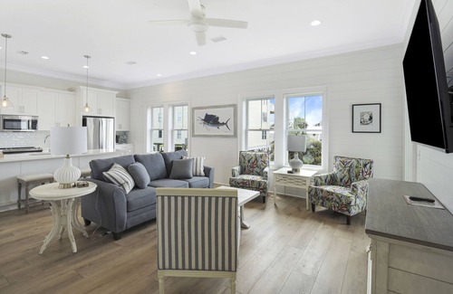 Gulf Shores Cabaña | Coastal beach cottage steps away from the white sand beaches!