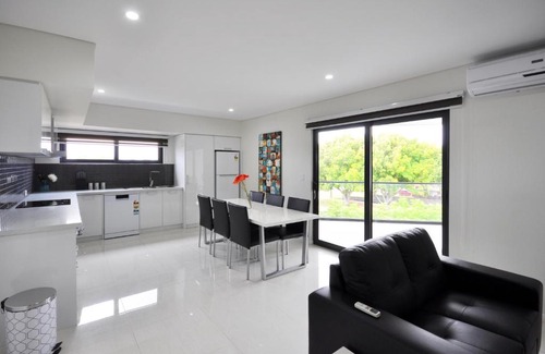 Rockingham Apartamento | Coastal By Rockingham Apartments