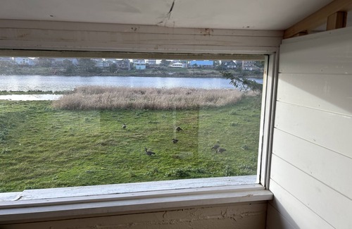 Pacific City Cabaña | Coastal Cottage w/ river frontage and just steps from the beach.