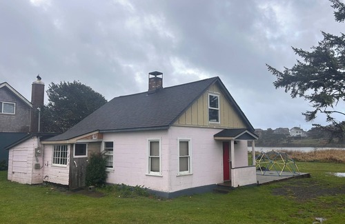 Pacific City Cabaña | Coastal Cottage w/ river frontage and just steps from the beach.