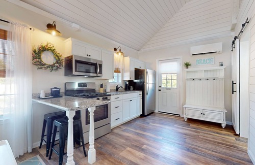 Lower Township Cabaña | Coastal Estate – Private Cottage with King Bed & Pool Access