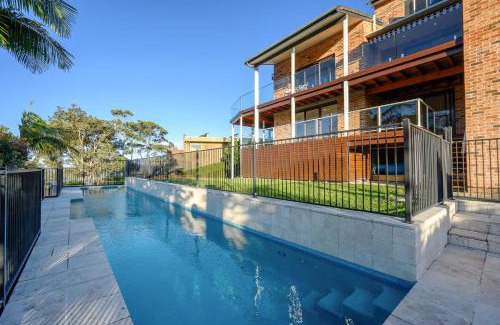 Tascott Casa | Coastal Luxury 2BR w Pool & Entertainer's Paradise