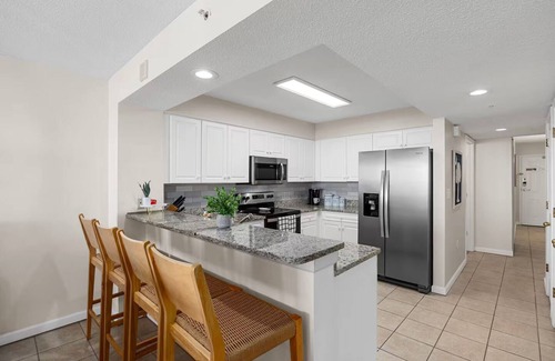 Ocean Drive Condominio | Coastal Palm - Panoramic Views - Indoor & Outdoor Pool, Lazy River & Hot Tub