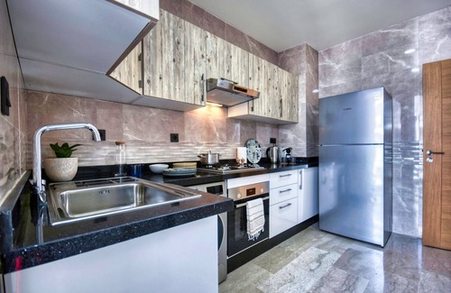 Agadir Bay Apartamento | Coastal-Apartamento-De Lujo-Baño para personas con movilidad reducida-Vista a...