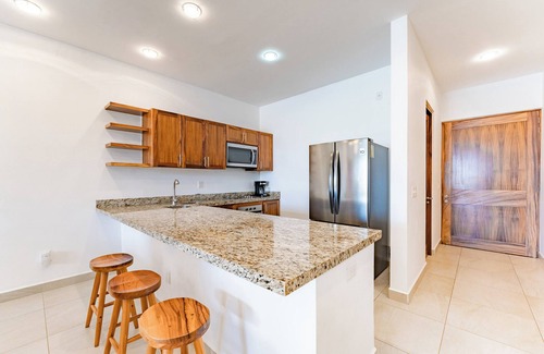 Huautlco Condominio | Coastal Views and Private Beach Access