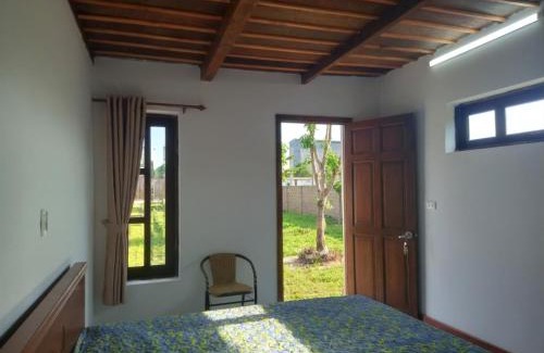 Dat Do Casa | CocoPalm Villa near Beach - Palm Room