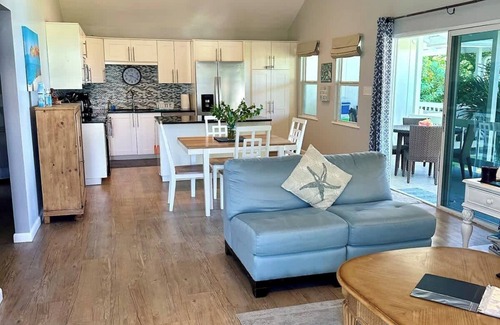 Seven Mile Beach Condominio | Excelentes vistas, excelente snorkeling en este moderno 2 BR -Cocoplum # 8 por Cayman Vacation