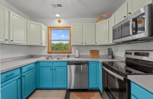 Carova Beach Casa | Colorful Carova Beach Oasis. Pet friendly with a Pool! 4x4