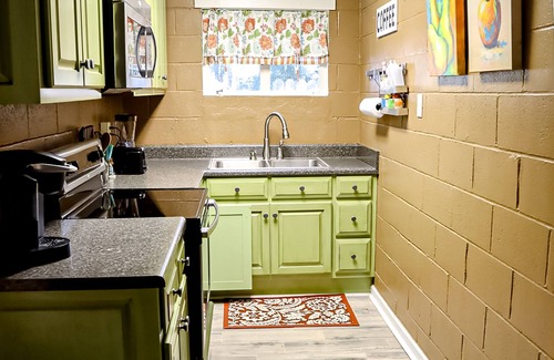 Cobb Cabina | Colorful lakefront home with private dock, scenic porch, washer/dryer, & AC