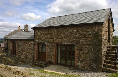 Crynant Cabaña | El antiguo molino en Little Walterstone Farm, Penmaen, península de Gower, Gales