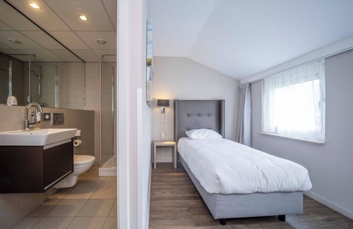Westkapelle Hotel | Comfort and Convenience: Outdoor Pool, Free Parking, & Outdoor Activities