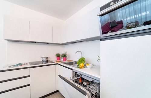 Lignano Sabbiadoro Apartamento | Comodidad y espacio combinados en un apartamento con estilo