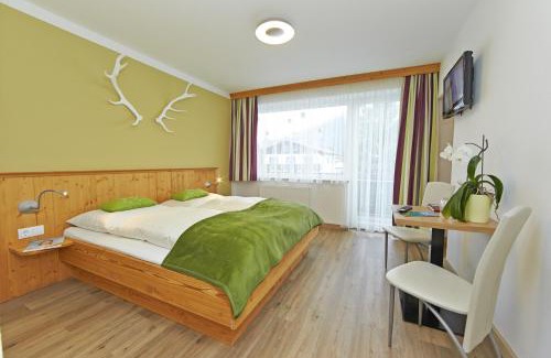 Schuttdorf Hotel | Comfort Hotel Garni Landhaus Gitti