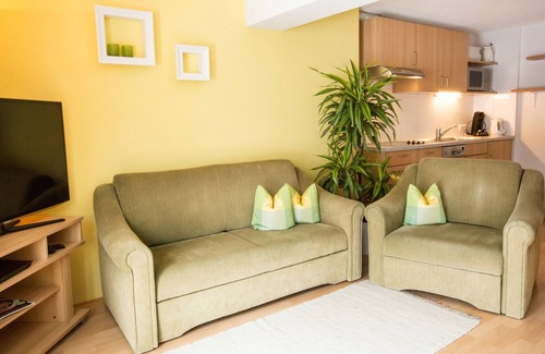 Schroecken Apartamento | Cómodo apartamento con terraza, zona para tomar el sol, parque infantil, wifi gratuito, mascotas