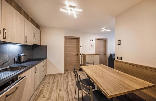 Predazzo Apartamento | Cómodo apartamento "Vacanze Arcobaleno - Azzurro" con vistas a la montaña