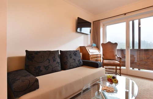 Ellmau Cabaña | Habitación doble de bienestar Wilder Kaiser - Café-Restaurant Bettina