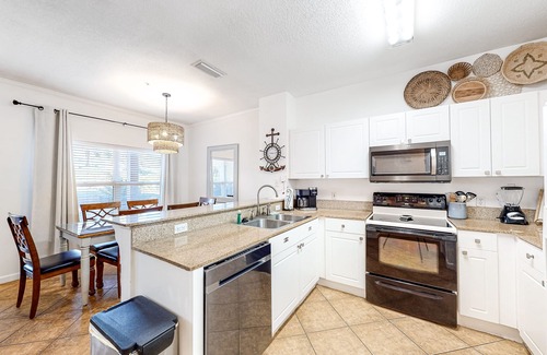 Frangista Beach Condominio | Comfortable ground floor condo with pool & hot tub access, W/D, WiFi, and AC