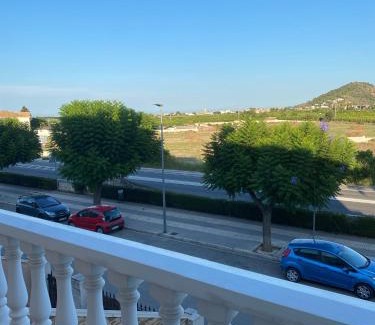 Beniarjo Casa | Comfortable guest room with balcony