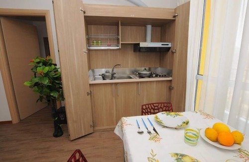Isola del Bosco - Delle Corti Apartamento | Sesto San Giovanni: apartamento en una residenciaApartamento en una residencia