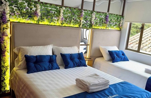 Usaquen Hotel | Comfortable room in Unicentro Rooms for 3 people