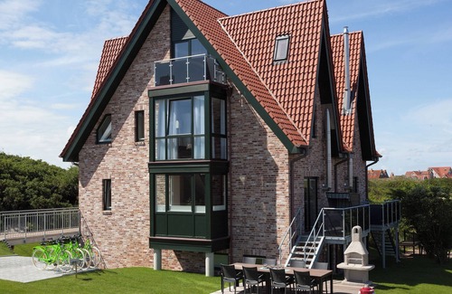 Juist Casa | Comfortable vacation home Juist: dune view, 5 bedrooms, 4 bathrooms, guest WC, fireplace, barbecue