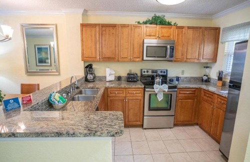 Florida Central Atlantic Coast Hotel | Comfy 2BR Suite, Free Shuttle, Parking, 4 Pools, Mini Golf