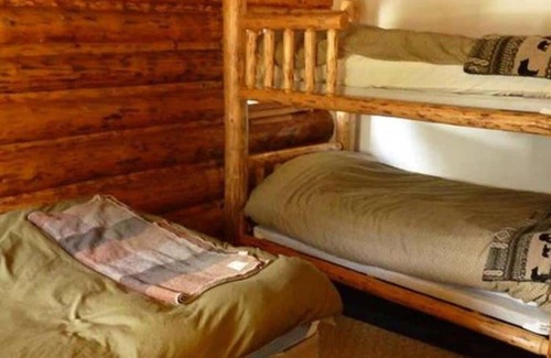 Cooke City-Silver Gate Cabina | Comfy cabin is situated on the Silver Gate property which overlooks 10,000ft tall mountain peaks surrounding the town.