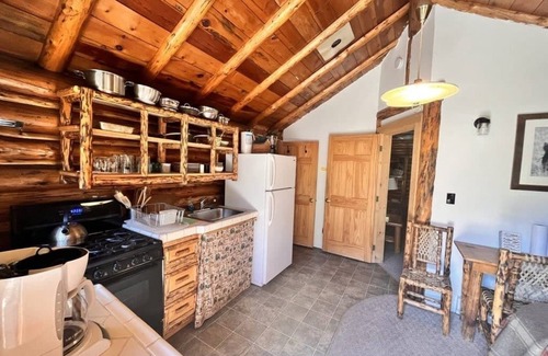 Cooke City-Silver Gate Cabina | Comfy cabin is situated on the Silver Gate property which overlooks 10,000ft tall mountain peaks surrounding the town.