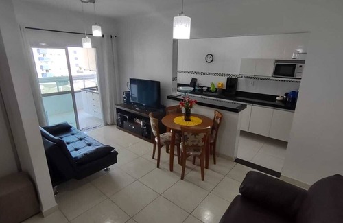 Praia Grande Apartamento | Complete apartment with sea view, 1 block from the beach and 1 parking space
