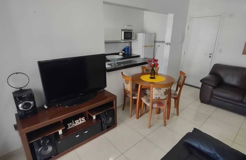 Praia Grande Apartamento | Complete apartment with sea view, 1 block from the beach and 1 parking space